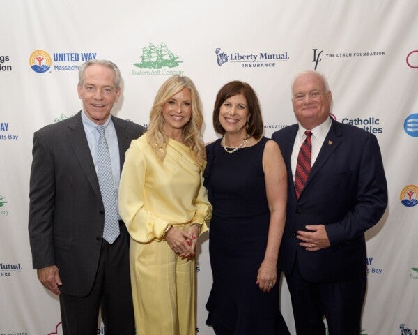 Suffolk Chairman & CEO John Fish, CBS News Anchor Paula Ebben, Catholic Charities Boston President & CEO Kelley Tuthill and Catholic Charities Boston Board Chair Mark Kerwin